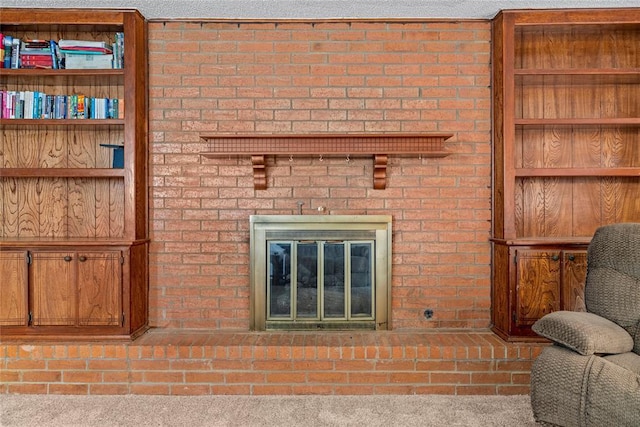 details featuring carpet flooring and a fireplace