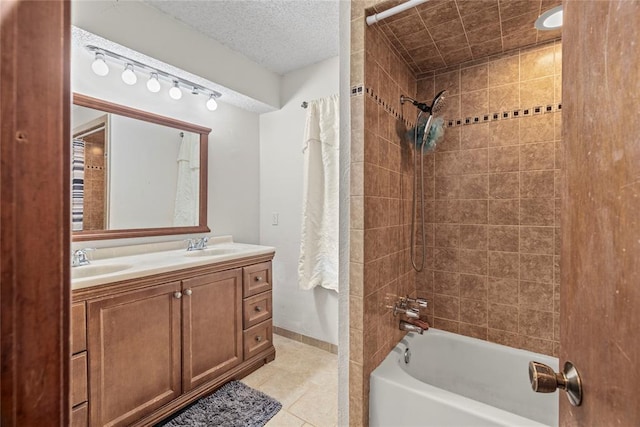 bathroom featuring double vanity, a sink, tile patterned floors, and bathtub / shower combination