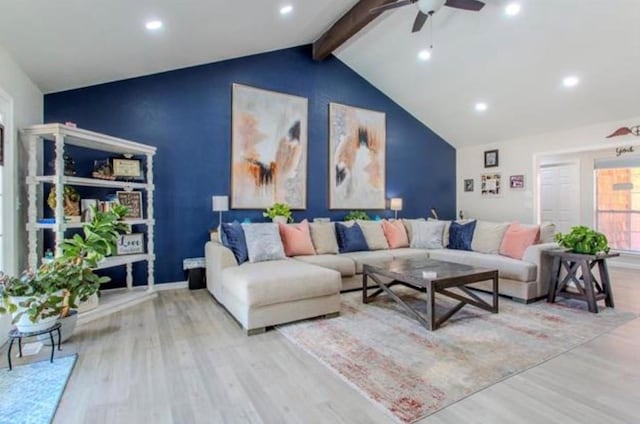 living area with lofted ceiling with beams, a ceiling fan, recessed lighting, and wood finished floors