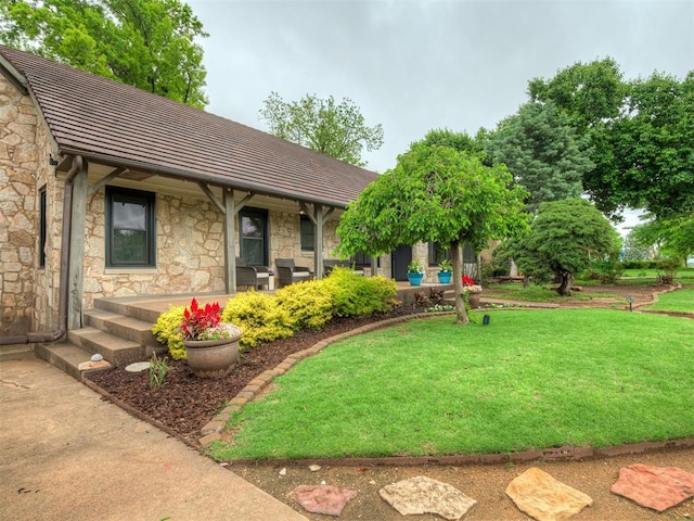 view of yard with a porch