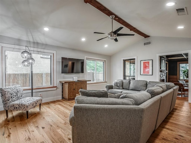 living area featuring visible vents, wood finished floors, recessed lighting, lofted ceiling with beams, and ceiling fan with notable chandelier