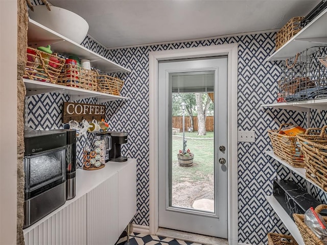 interior space featuring wallpapered walls