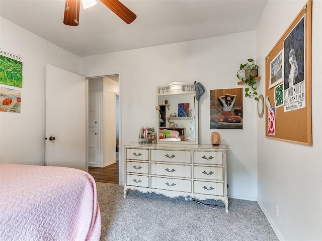 carpeted bedroom featuring a ceiling fan