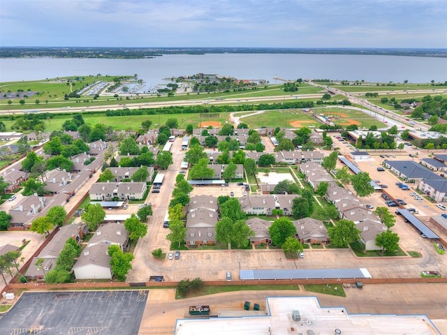 aerial view featuring a water view and a residential view