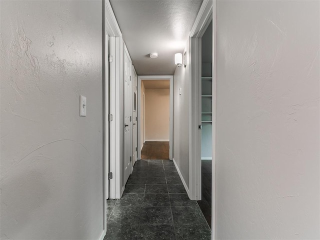 corridor with baseboards