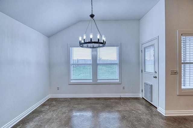 1114 Old Frisco Rd, Norman, OK 73069 - unfurnished dining area with a wealth of natural light, lofted ceiling, concrete floors, and a notable chandelier