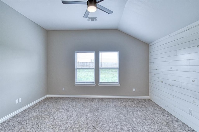 1114 Old Frisco Rd, Norman, OK 73069 - spare room featuring carpet, a ceiling fan, baseboards, lofted ceiling, and visible vents