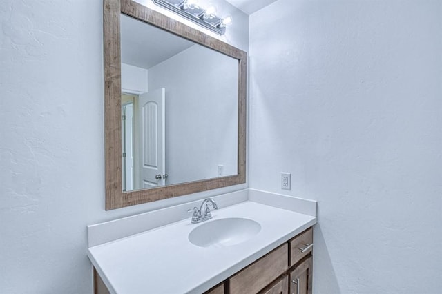 1114 Old Frisco Rd, Norman, OK 73069 - bathroom with vanity and a textured wall