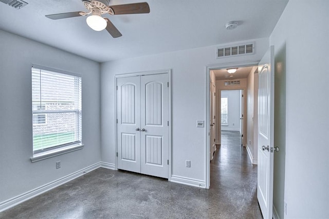 1114 Old Frisco Rd, Norman, OK 73069 - unfurnished bedroom featuring baseboards, visible vents, ceiling fan, and a closet