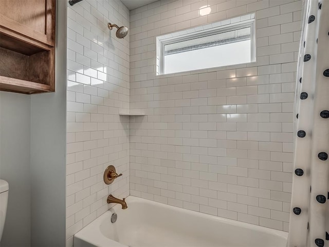 bathroom with shower / bath combo and toilet