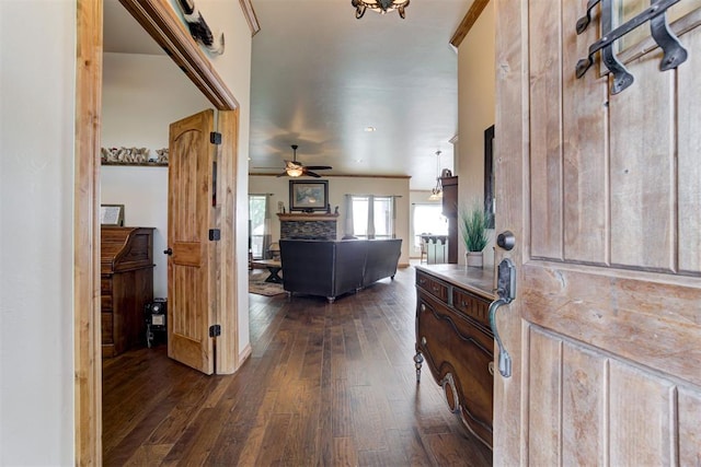 10608 Oaksplinter Ln, Oklahoma City, OK 73173 - foyer entrance with a ceiling fan and dark wood finished floors