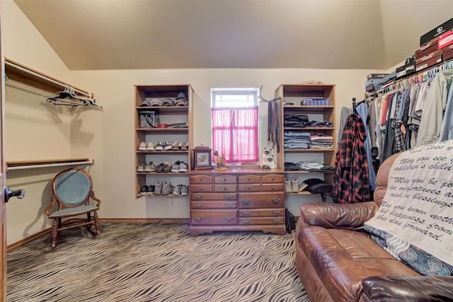 10608 Oaksplinter Ln, Oklahoma City, OK 73173 - walk in closet featuring carpet flooring and lofted ceiling