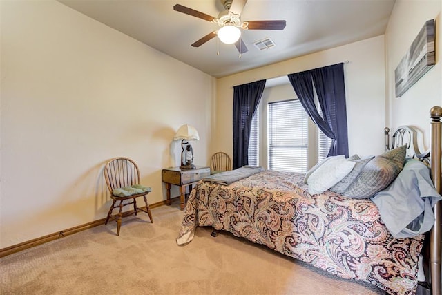 10608 Oaksplinter Ln, Oklahoma City, OK 73173 - bedroom with visible vents, carpet flooring, baseboards, and a ceiling fan