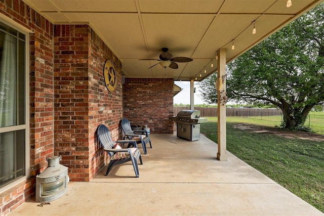 10608 Oaksplinter Ln, Oklahoma City, OK 73173 - view of patio / terrace with a ceiling fan, fence, and a grill