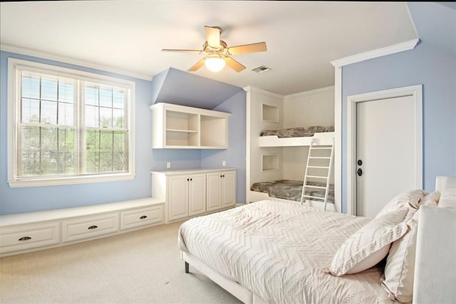 bedroom featuring ceiling fan, visible vents, light carpet, and ornamental molding