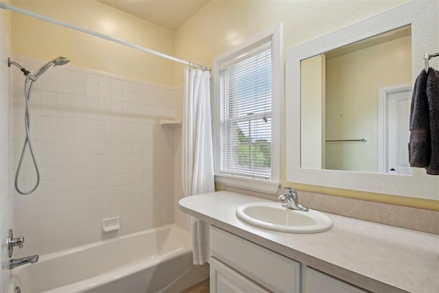 bathroom with shower / tub combo with curtain and vanity