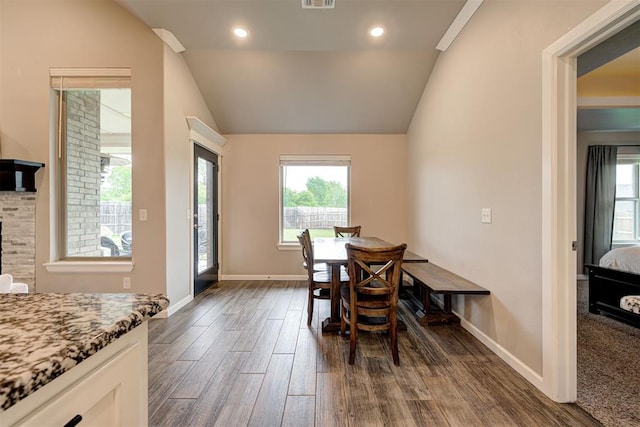 dining area featuring visible vents, vaulted ceiling, baseboards, recessed lighting, and dark wood-type flooring
