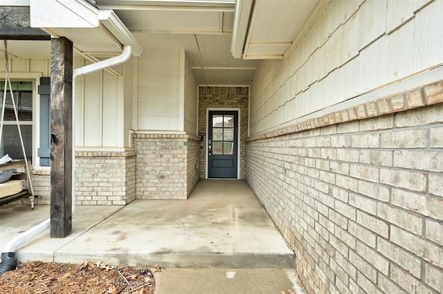 1806 Logans Way, Norman, OK 73072 - doorway to property featuring brick siding