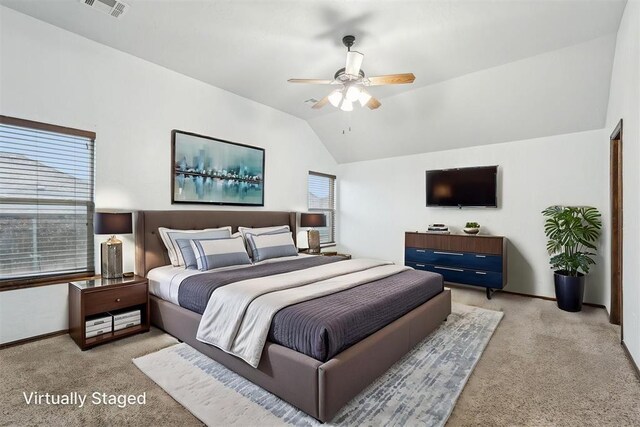 bedroom featuring vaulted ceiling, baseboards, carpet flooring, and visible vents