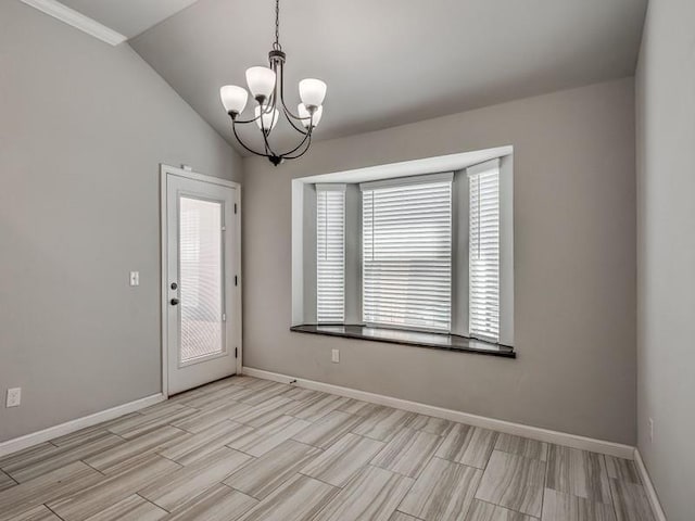 unfurnished room with wood tiled floor, baseboards, vaulted ceiling, and a chandelier