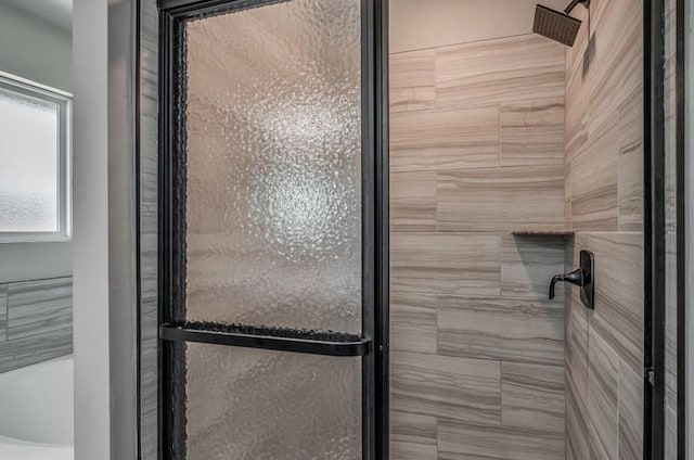 interior details with a shower stall