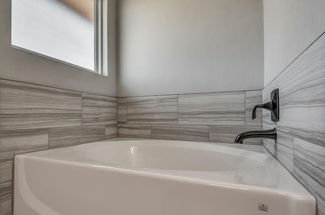 full bath with a bath