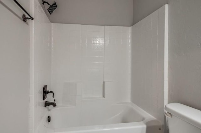 full bathroom featuring visible vents, shower / bathtub combination, and toilet