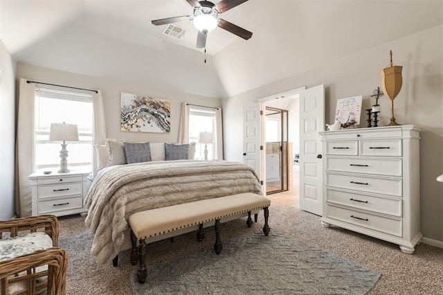 bedroom with light colored carpet, vaulted ceiling, and ceiling fan