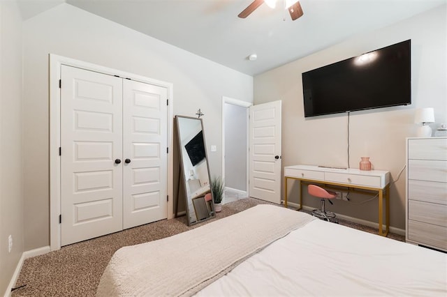 bedroom with a closet, carpet, baseboards, and a ceiling fan