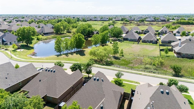 aerial perspective of suburban area featuring a large body of water