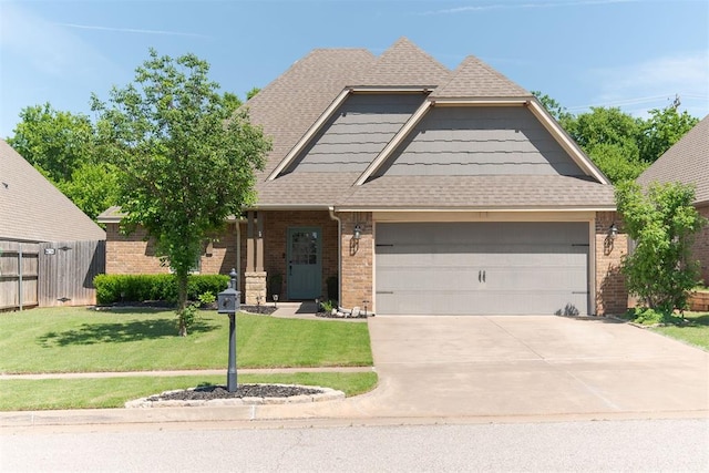 craftsman house featuring concrete driveway, brick siding, an attached garage, and a shingled roof