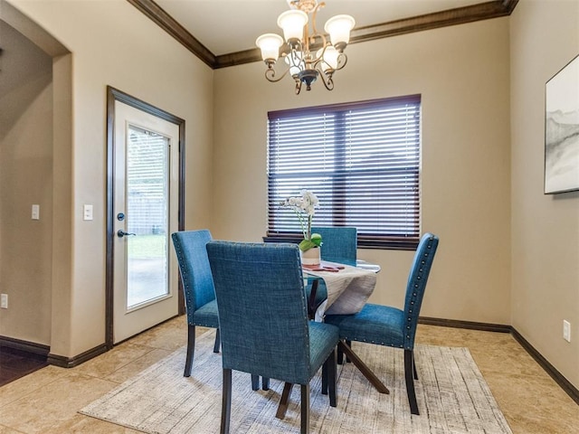 dining area featuring baseboards, an inviting chandelier, and ornamental molding