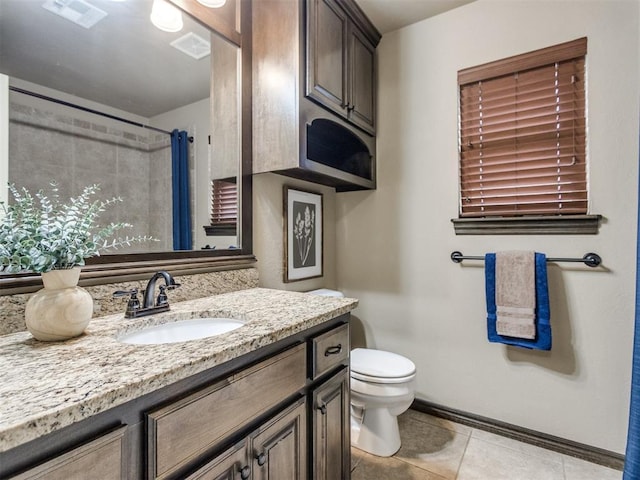 bathroom featuring a shower with curtain, visible vents, tile patterned flooring, vanity, and toilet