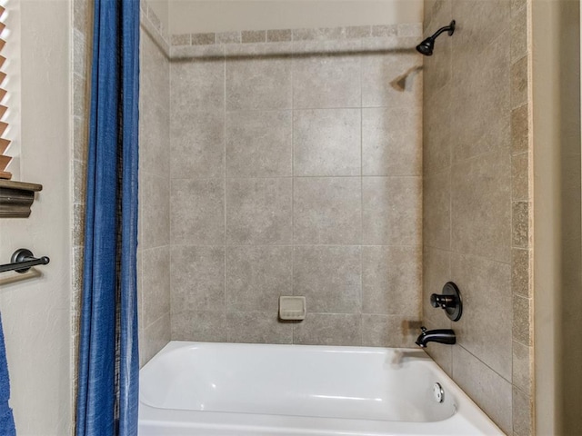 bathroom featuring shower / bath combination with curtain