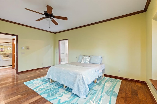 bedroom featuring baseboards, crown molding, wood finished floors, and ceiling fan