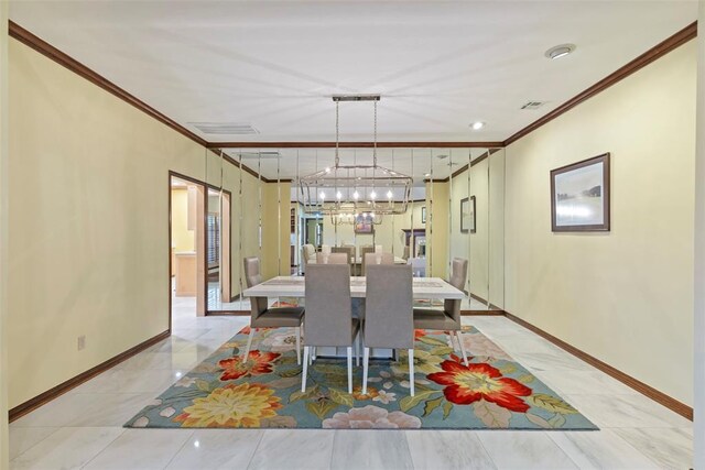 6208 Waterford Blvd Unit 95, Oklahoma City, OK 73118 - dining room with crown molding, baseboards, and a chandelier
