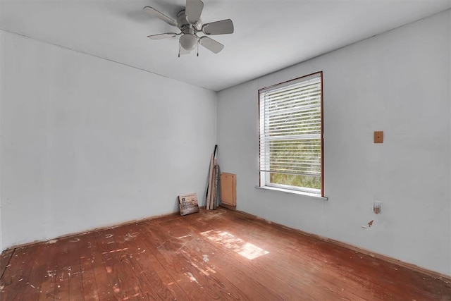 spare room with ceiling fan and hardwood / wood-style floors