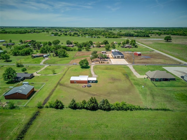 birds eye view of property featuring a rural view