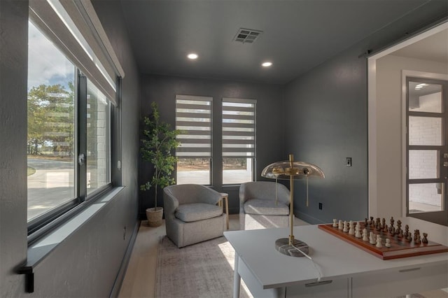 interior space featuring recessed lighting, visible vents, and a healthy amount of sunlight