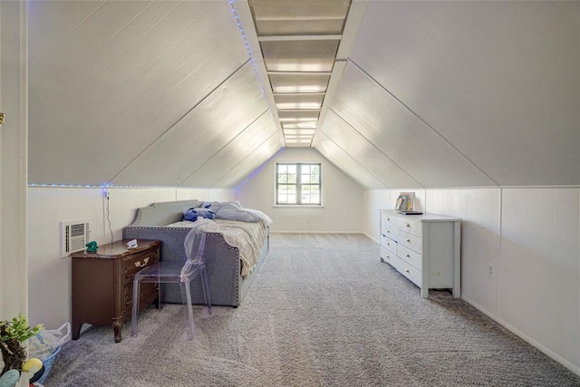bedroom featuring carpet flooring, visible vents, and lofted ceiling