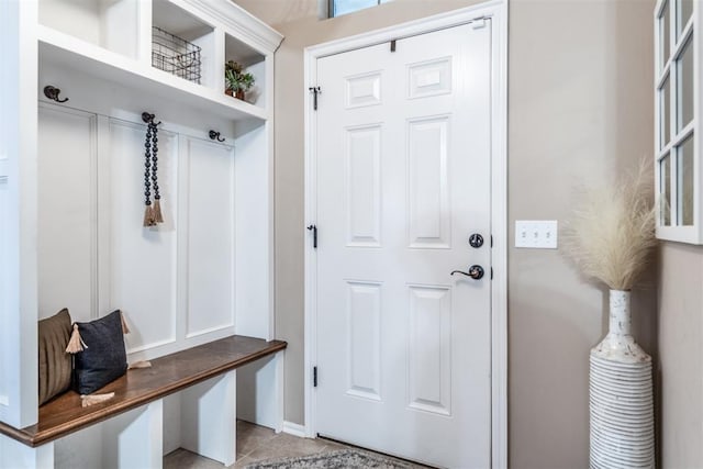 mudroom with light tile patterned floors