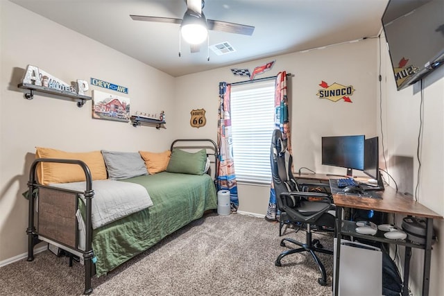 bedroom with visible vents, carpet flooring, baseboards, and a ceiling fan