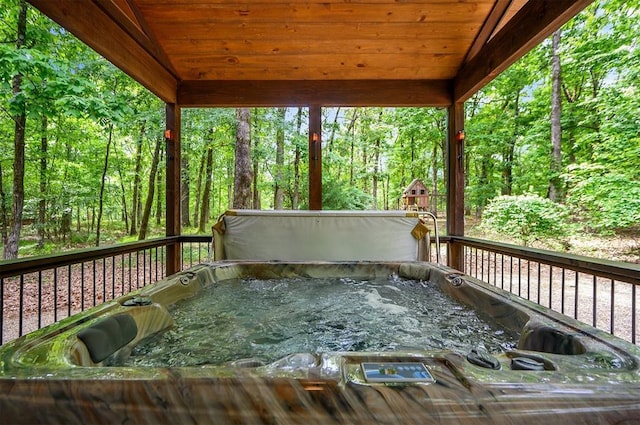 678 N State Highway 259a, Broken Bow, OK 74728 - wooden deck featuring a hot tub