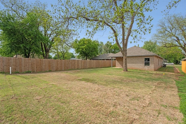 view of yard with fence