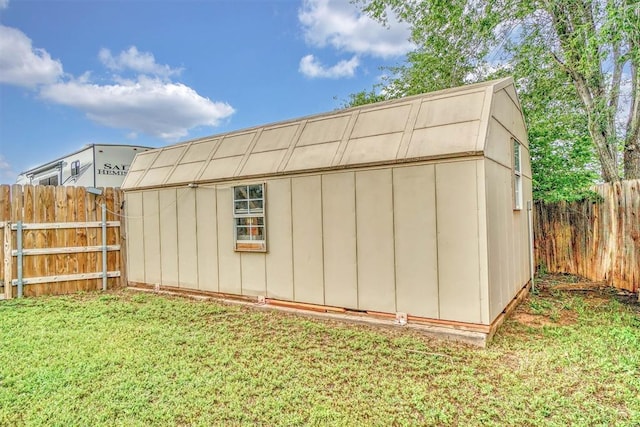 view of shed featuring a fenced backyard