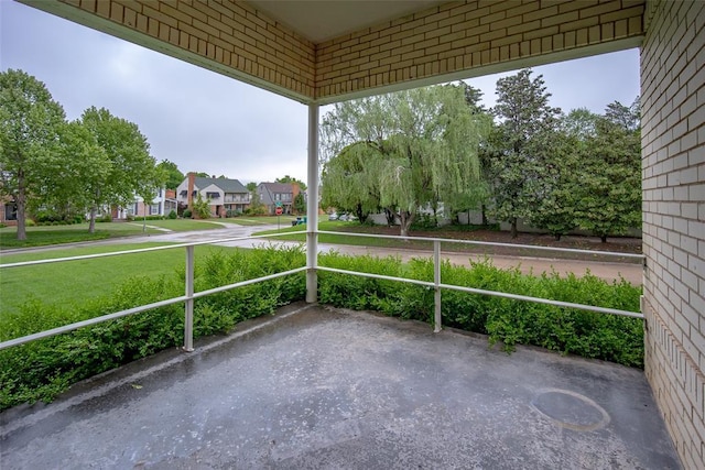 1000 NW 37th St Unit 1000 & 1002, Oklahoma City, OK 73118 - unfurnished sunroom with a residential view