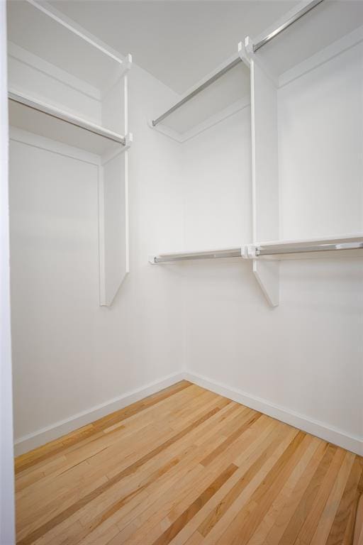 1000 NW 37th St Unit 1000 & 1002, Oklahoma City, OK 73118 - walk in closet with wood finished floors