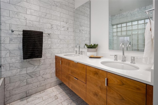 1000 NW 37th St Unit 1000 & 1002, Oklahoma City, OK 73118 - full bathroom with double vanity, tile walls, a sink, and marble finish floor