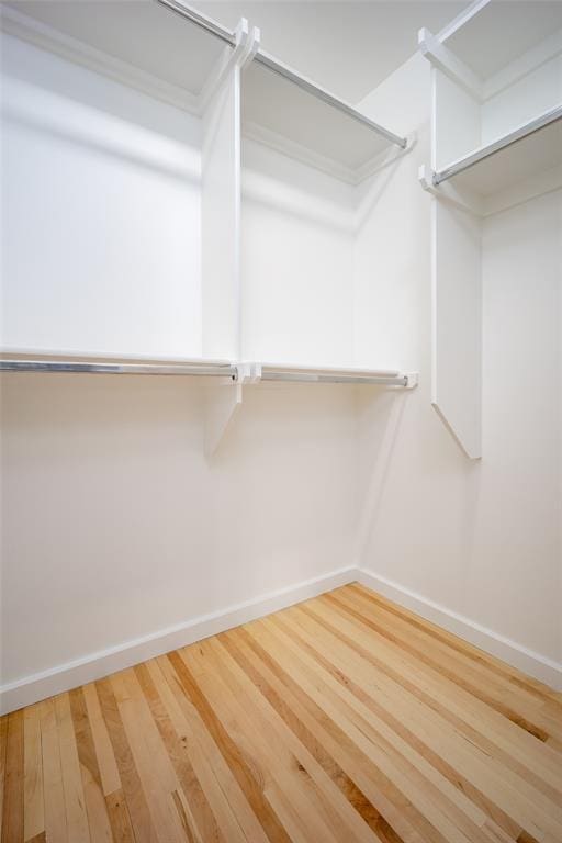 1000 NW 37th St Unit 1000 & 1002, Oklahoma City, OK 73118 - spacious closet featuring wood finished floors