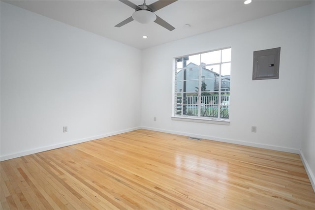 1000 NW 37th St Unit 1000 & 1002, Oklahoma City, OK 73118 - empty room with ceiling fan, light wood-style floors, recessed lighting, baseboards, and electric panel